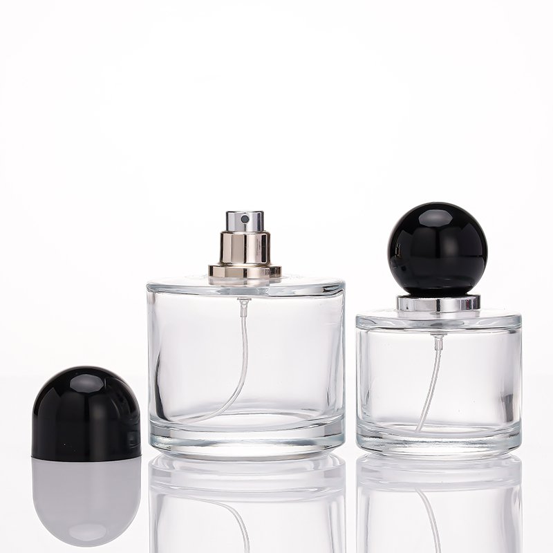 Wholesale fancy 50ml 1.5oz 3oz 100ml perfume glass bottle Atomizer clear round empty perfume bottles 50ml spray bottle black cap
