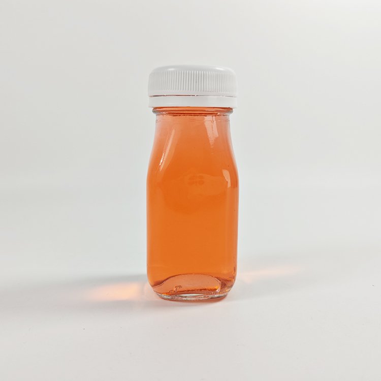Wholesale recyclable 100ml Clear Beverage Square Glass Bottle Cold Press Fruit Juice Bottles With Airtight Screw Cap