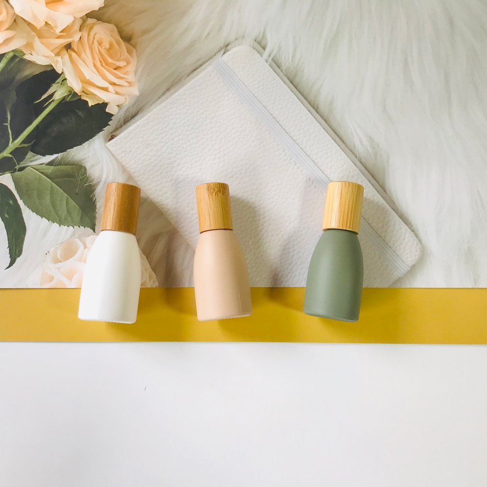 Wholesale morandi matte roll on glass bottle 10ml 12ml with wood bamboo lid for essential oil