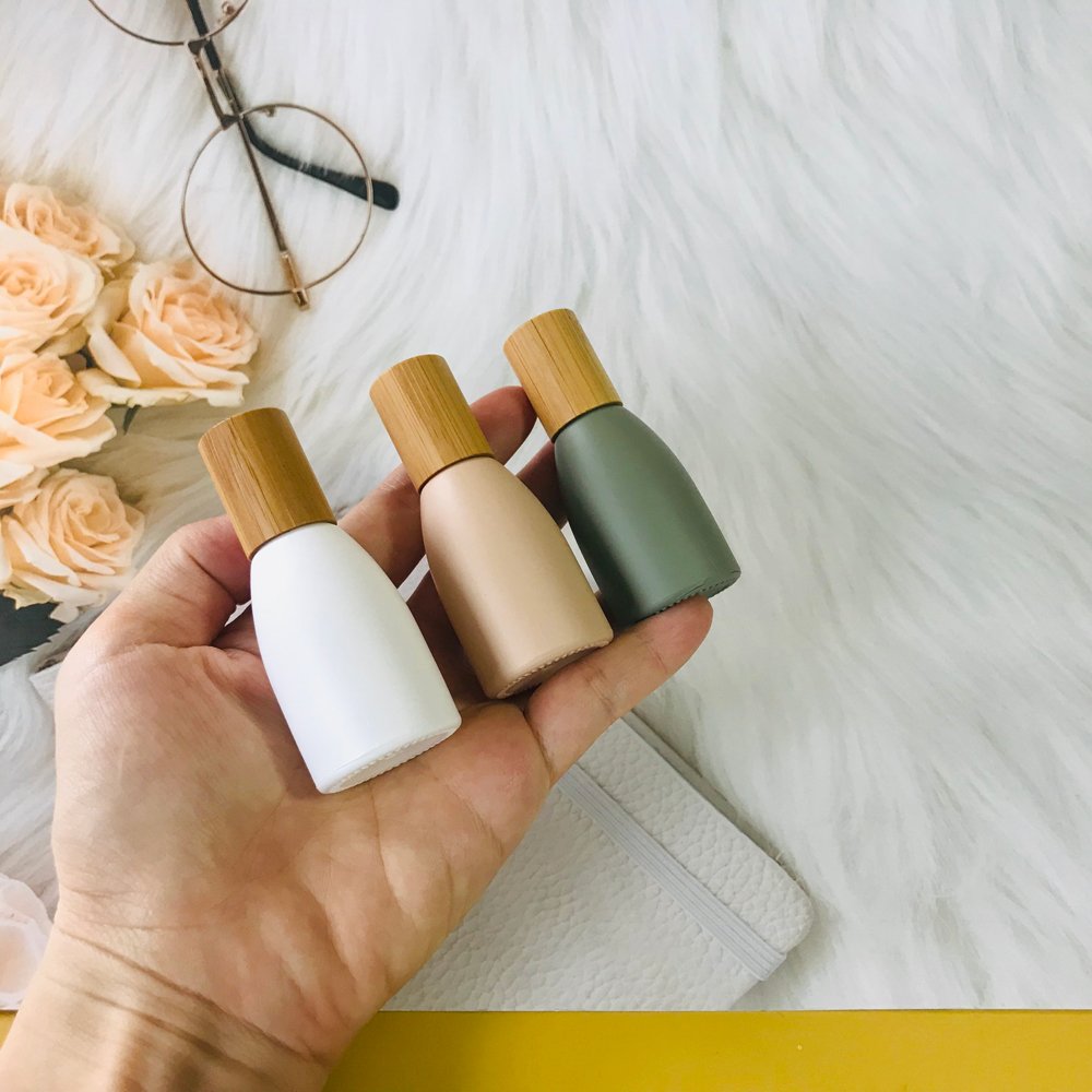 Wholesale morandi matte roll on glass bottle 10ml 12ml with wood bamboo lid for essential oil