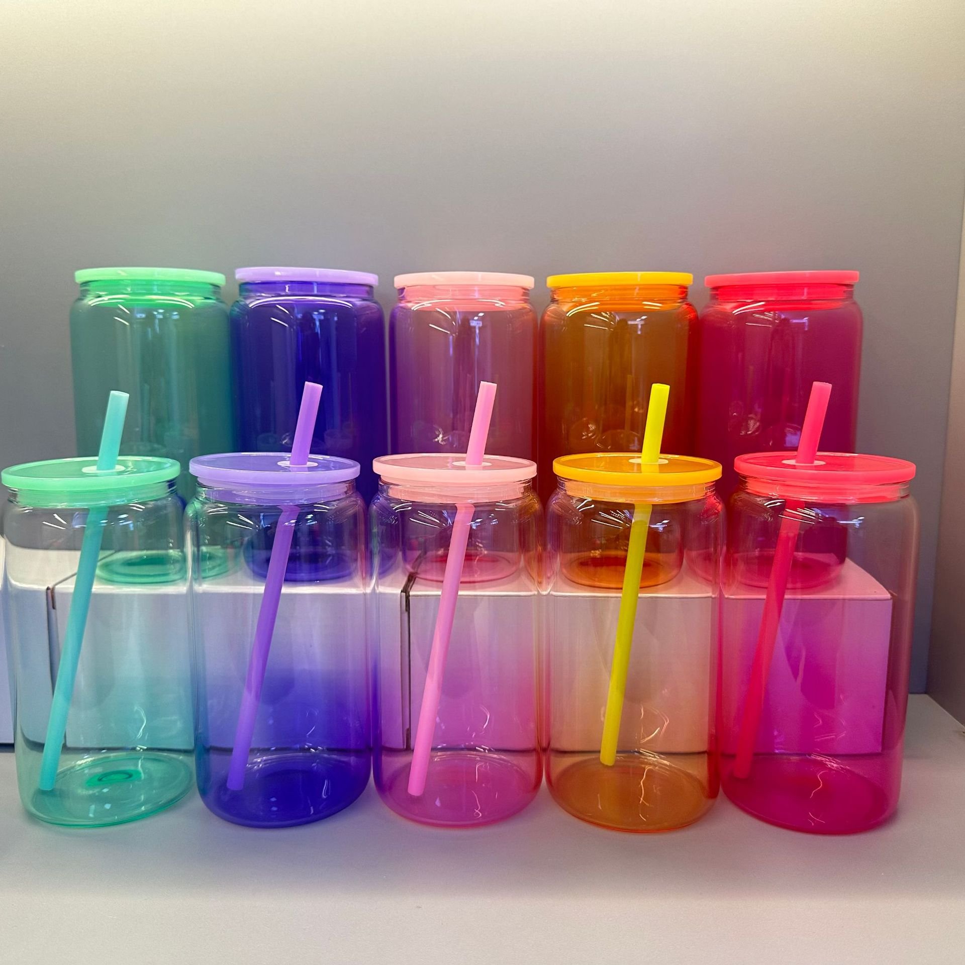 Borosilicate glass bottles bpa free high quality colored drink water bottles with straw lids
