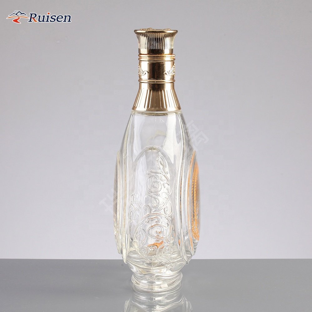 Custom Embossed Glass Vodka Bottle 750ML Flat Round Vodka With Crown Cap