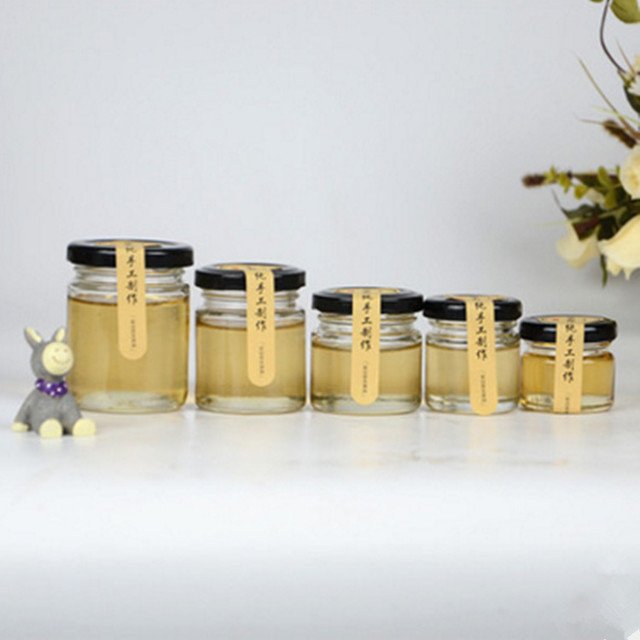wholesale factory price available different sizes bulk honey jar mini glass bottles for honey