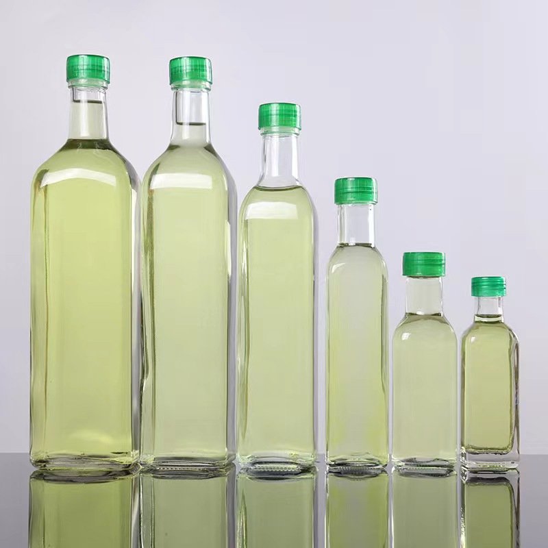 Customized circular square glass oil bottle 100ml 250ml 500ml 750ml dark green edible olive oil bottle