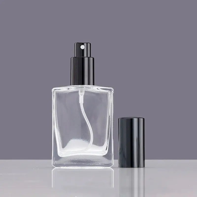 Empty new design cosmetic mist spray bottles custom colorful 50ml 100 ml luxury perfume glass bottle