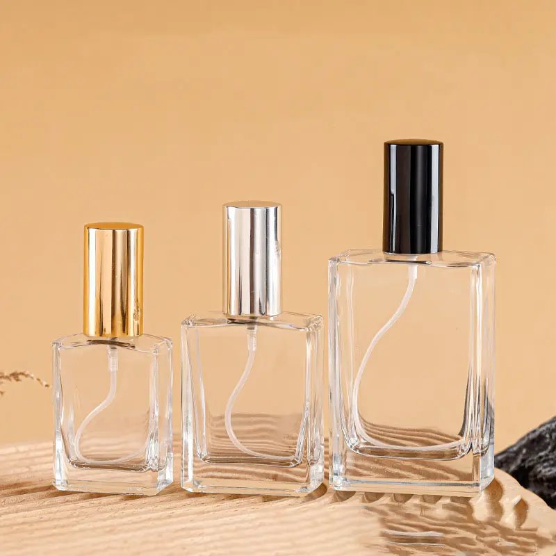 Empty new design cosmetic mist spray bottles custom colorful 50ml 100 ml luxury perfume glass bottle