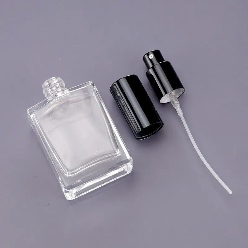 Empty new design cosmetic mist spray bottles custom colorful 50ml 100 ml luxury perfume glass bottle