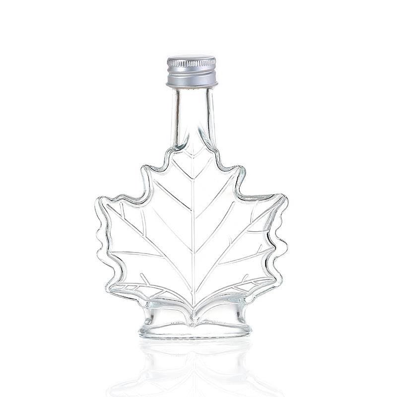 Unique 70ml 100ml 250ml Maple Leaf Shaped Glass Bottle Glass Beverage Bottle Dark Rum bottle with Screw Cap