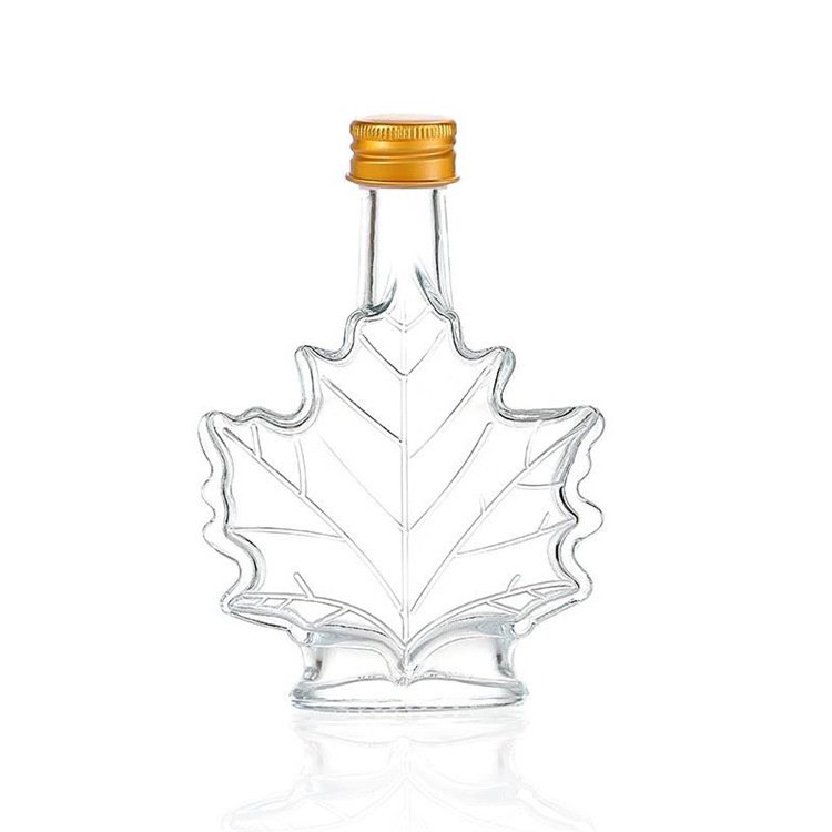 Unique 70ml 100ml 250ml Maple Leaf Shaped Glass Bottle Glass Beverage Bottle Dark Rum bottle with Screw Cap