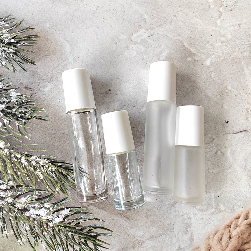 Essential oils roller bottle 5ml 10ml clear frosted glass roll on glass bottle with steel roller and screw white cap
