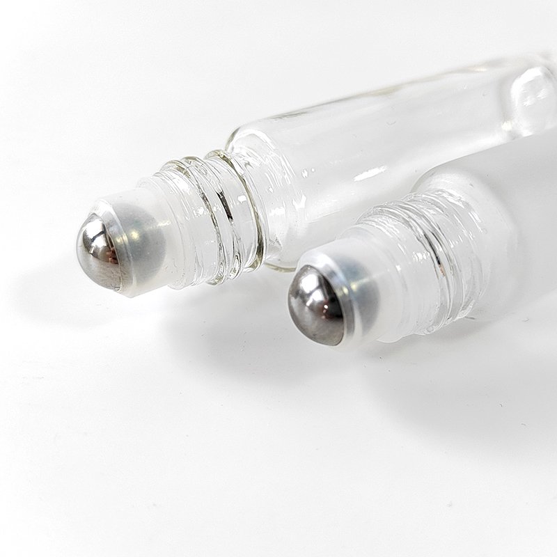 Essential oils roller bottle 5ml 10ml clear frosted glass roll on glass bottle with steel roller and screw white cap