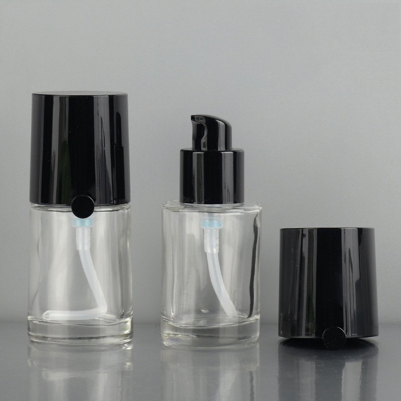 Innovation international big brand clear liquid foundation glass bottle 30ml cosmetic packaging empty bottle with airless pump