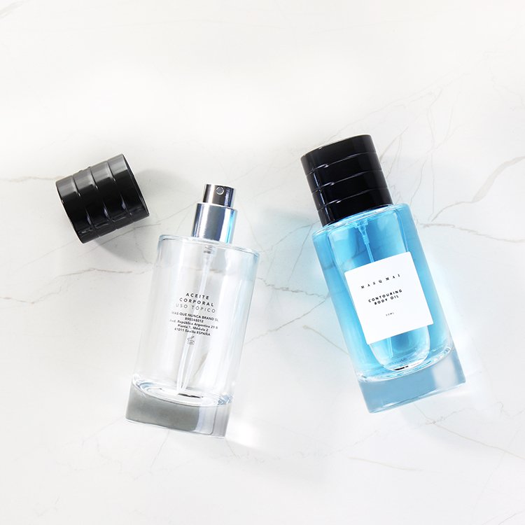 25ml 50ml 100ml Custom Round Empty Clear Fragrance Glass Perfume Bottle Perfume Glass Bottles with Spray pump perfume cap