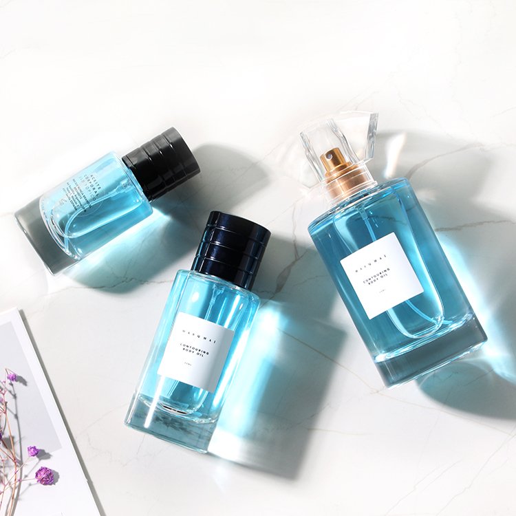 25ml 50ml 100ml Custom Round Empty Clear Fragrance Glass Perfume Bottle Perfume Glass Bottles with Spray pump perfume cap