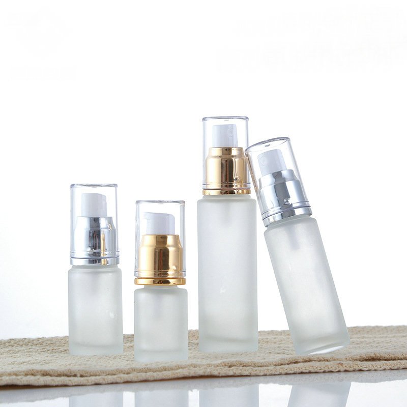 Customized frosted glass 15ml spray lotion pump press type cosmetic dispensing glass bottle