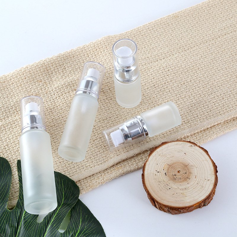 Customized frosted glass 15ml spray lotion pump press type cosmetic dispensing glass bottle