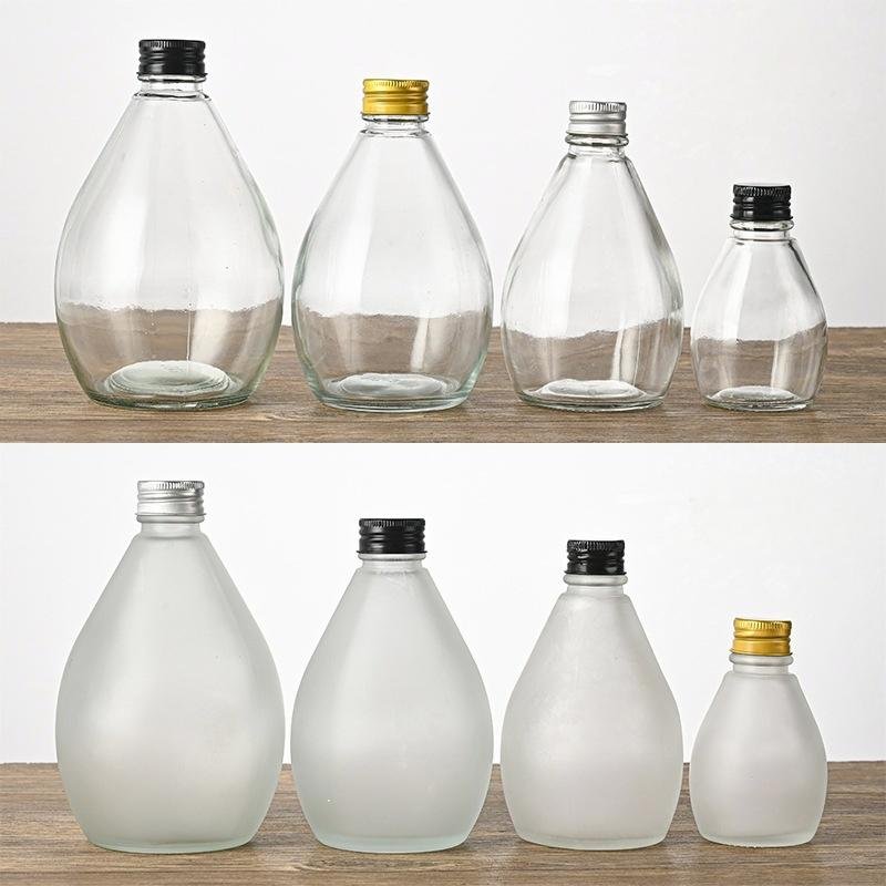 Cheap Export Beverage Juice Sodas Packaging Transparent Glass Bottle Glass Fruit Juice Bottle
