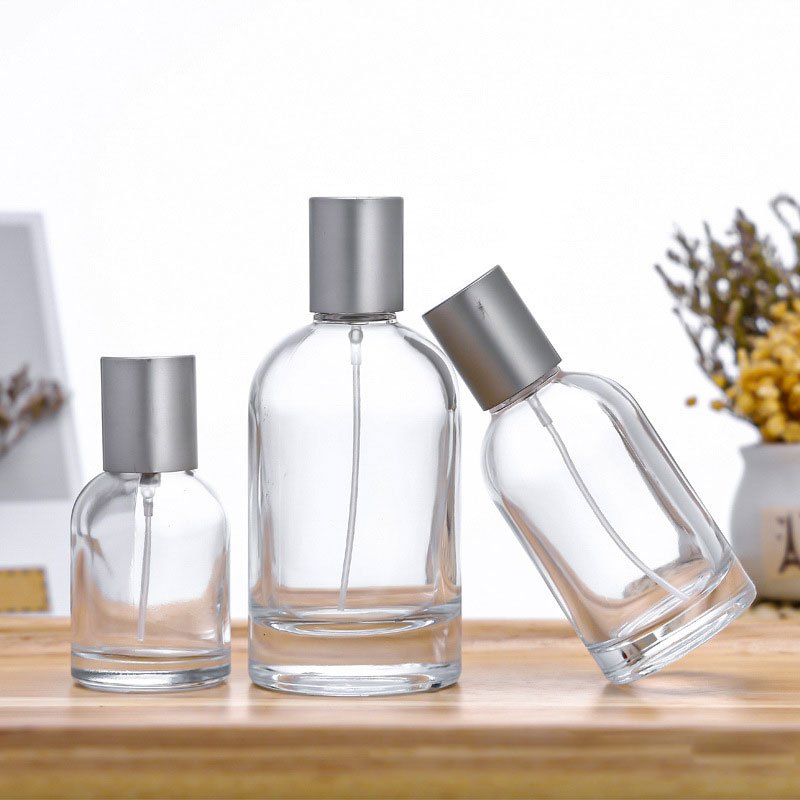 Luxury Cylinder Parfum Botol 30ml 50ml Empty Glass Fragrance Parfum Spray Bottle With Wooden Cap