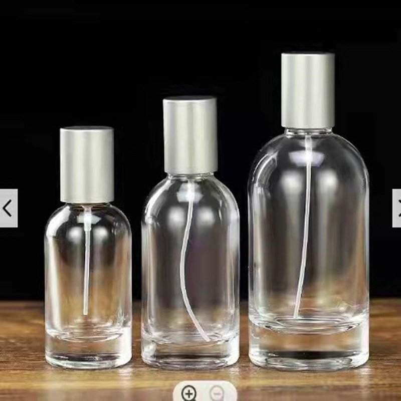 Luxury Cylinder Parfum Botol 30ml 50ml Empty Glass Fragrance Parfum Spray Bottle With Wooden Cap