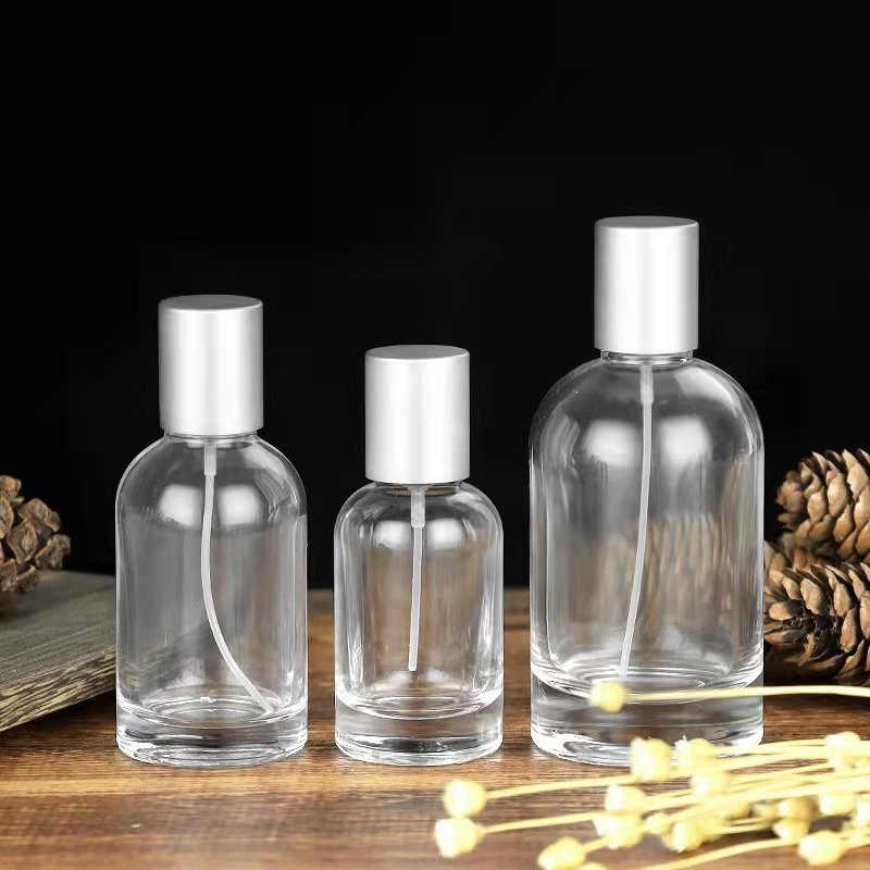 Luxury Cylinder Parfum Botol 30ml 50ml Empty Glass Fragrance Parfum Spray Bottle With Wooden Cap