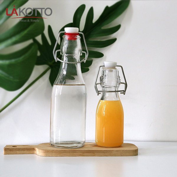 Wholesale Customized Recycled Clear wine bottle 100ml Round Classic Swing Top Glass Bottle 1L with Clip Top Stoppers