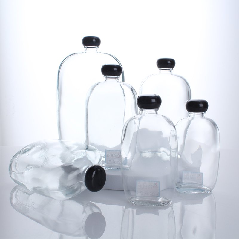 Customized Glass Bottle for Beverage Cold Brew Coffee Wine Liquor Tea Flat Flask with Lid 100ml 200ml 250ml 350ml 500ml Clear