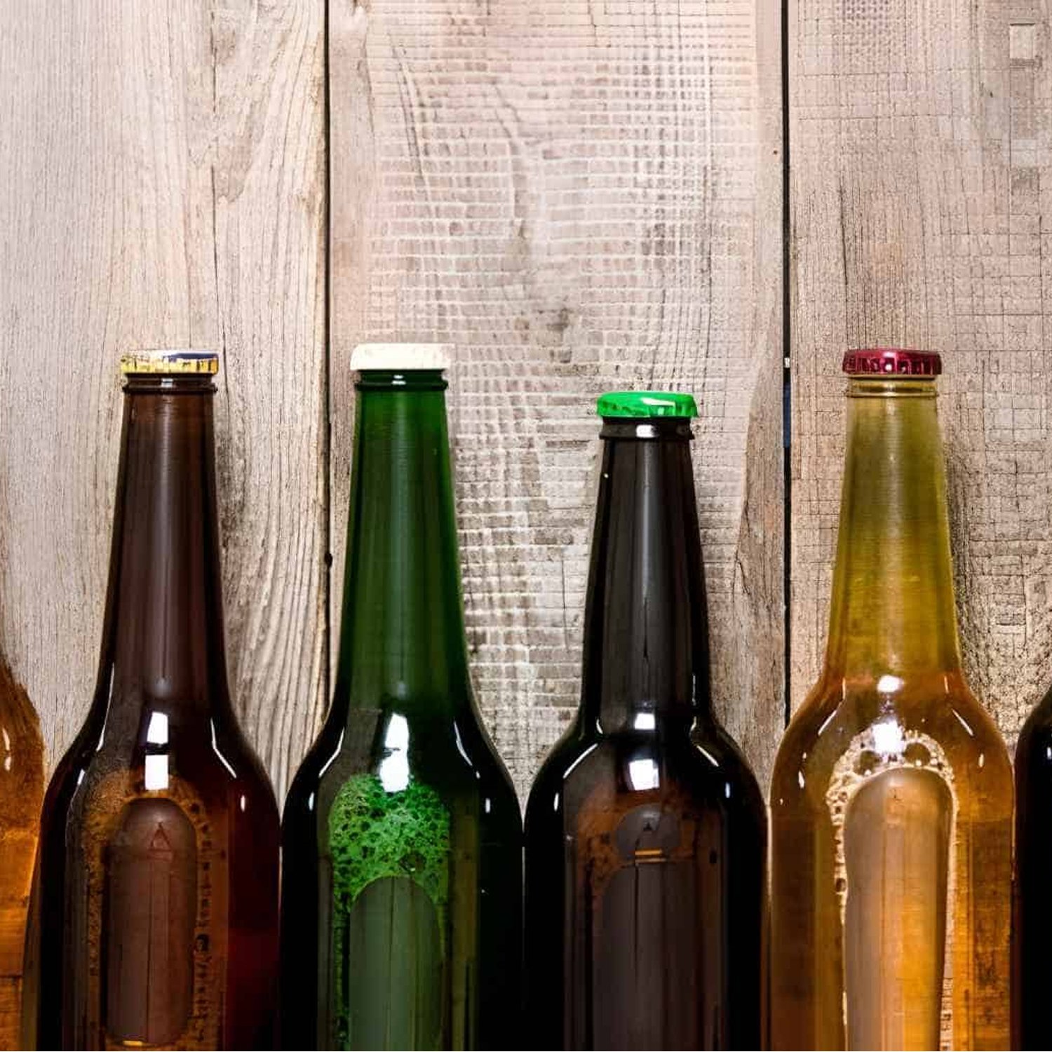 Top Quality 330 Ml 500 Ml Clear Round Glass Beer Bottles With Crown Cap