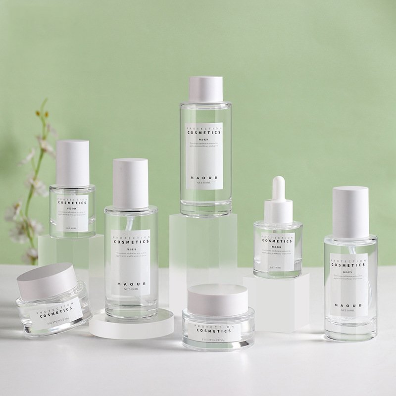 Factory New Design Luxury Frosted Makeup Skincare Set Glass Bottles and Jars Transparent Green Amber Lotion Bottles Cream Jars