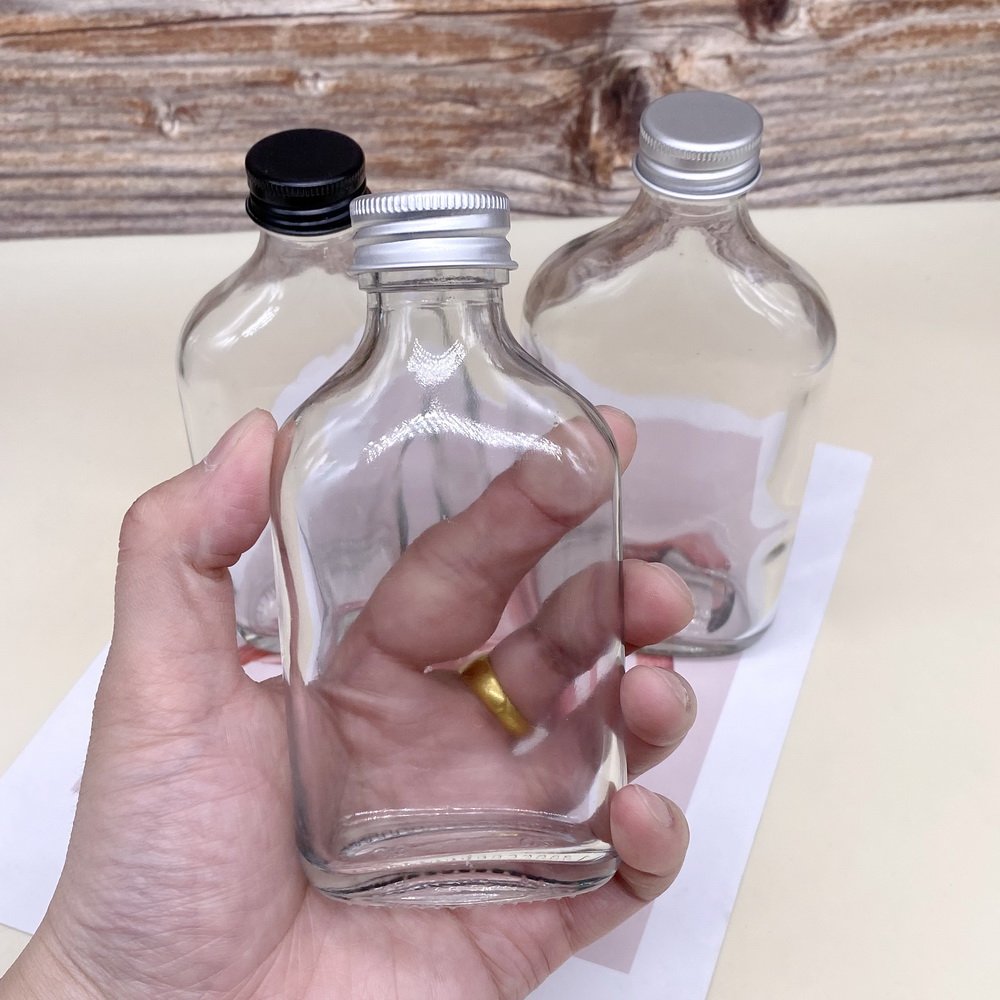 wholesale flat round empty liquor glass bottle with screw lid coffee milk juicer clear glass packaging container 200ml 350ml