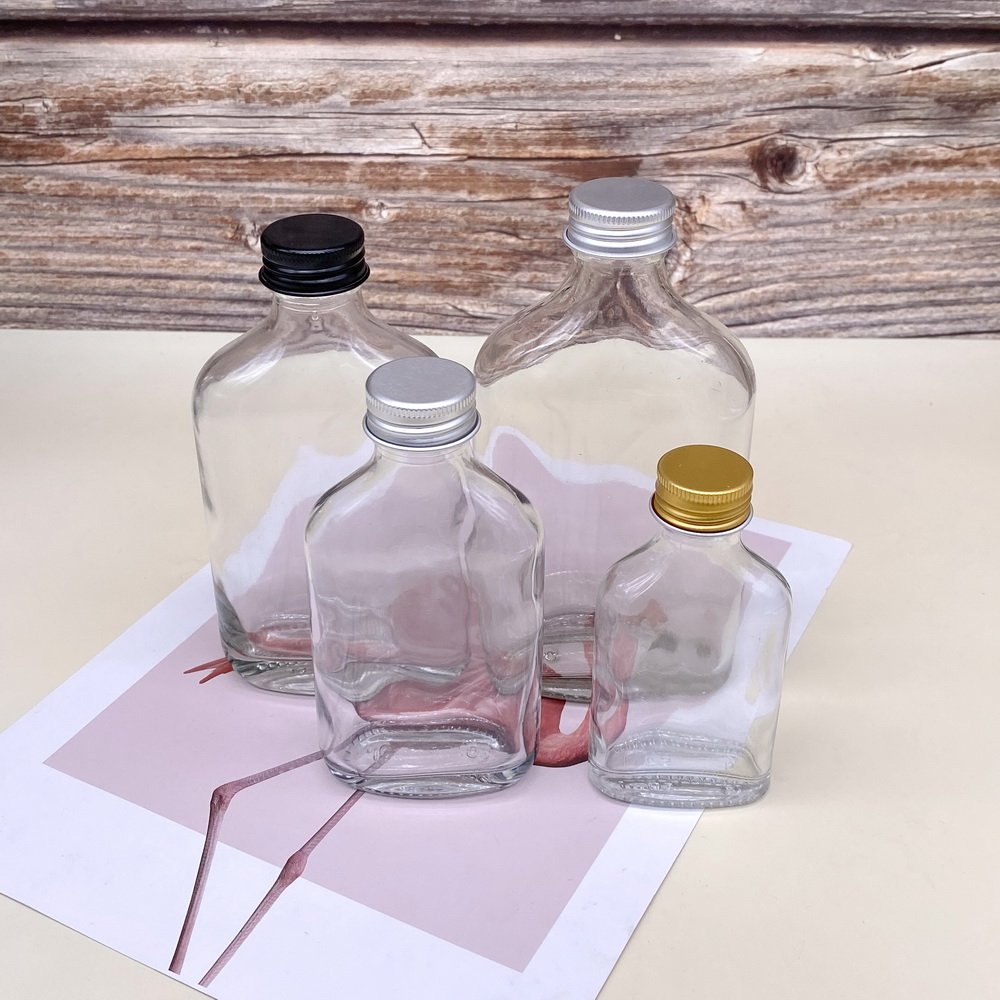 wholesale flat round empty liquor glass bottle with screw lid coffee milk juicer clear glass packaging container 200ml 350ml