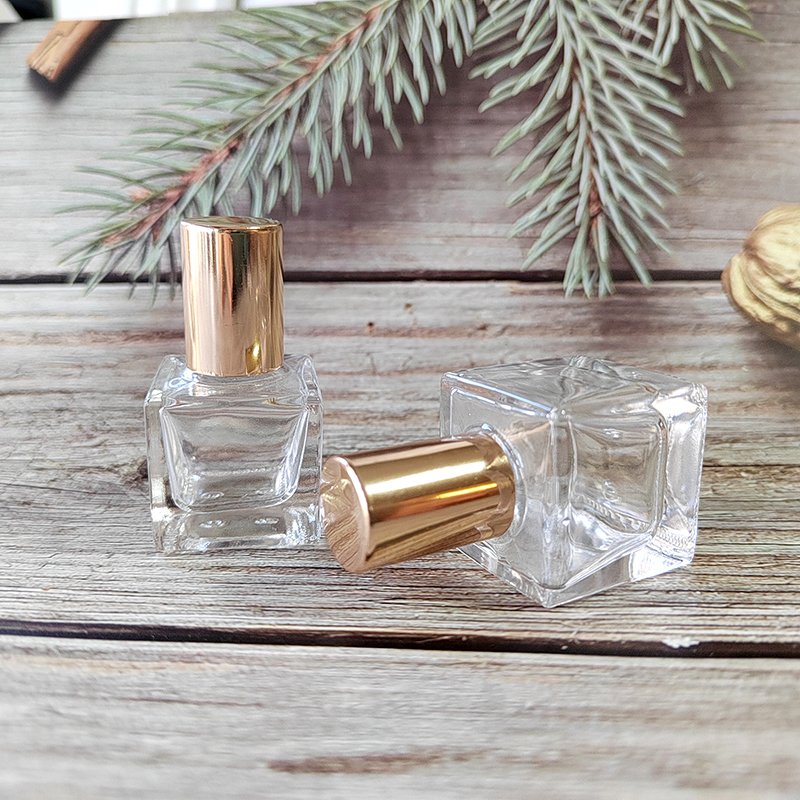Square glass perfume essential oils roll on bottle 5ml 10ml clear cube glass bottle with steel roller and shiny gold lid