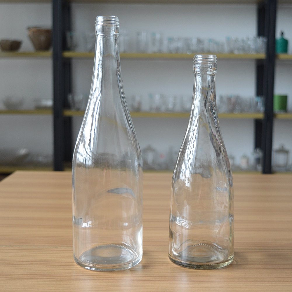 Packaging usage water drop cheap 750ml glass water bottle