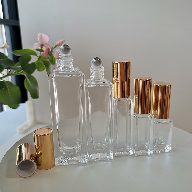 Empty essential oil glass roller bottle square 10 ml clear rectangular glass bottle with stainless steel roller for perfume oil