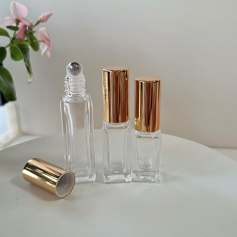Empty essential oil glass roller bottle square 10 ml clear rectangular glass bottle with stainless steel roller for perfume oil
