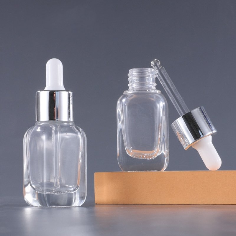 Wholesale 30ml mesh bottom transparent glass square dropper bottle for essence essential oil subfilling raw liquid