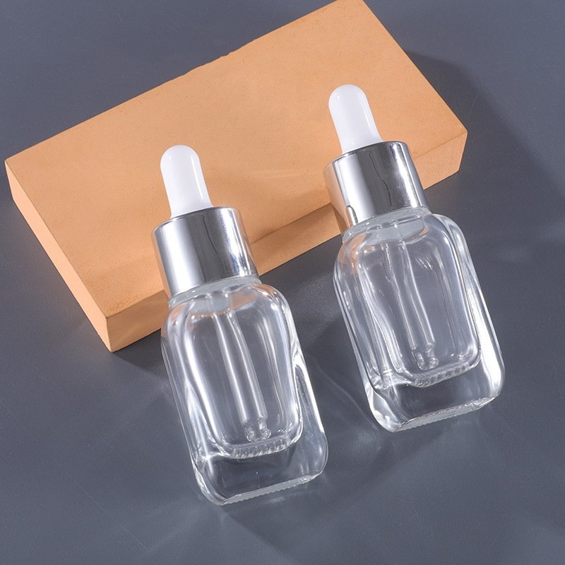 Wholesale 30ml mesh bottom transparent glass square dropper bottle for essence essential oil subfilling raw liquid