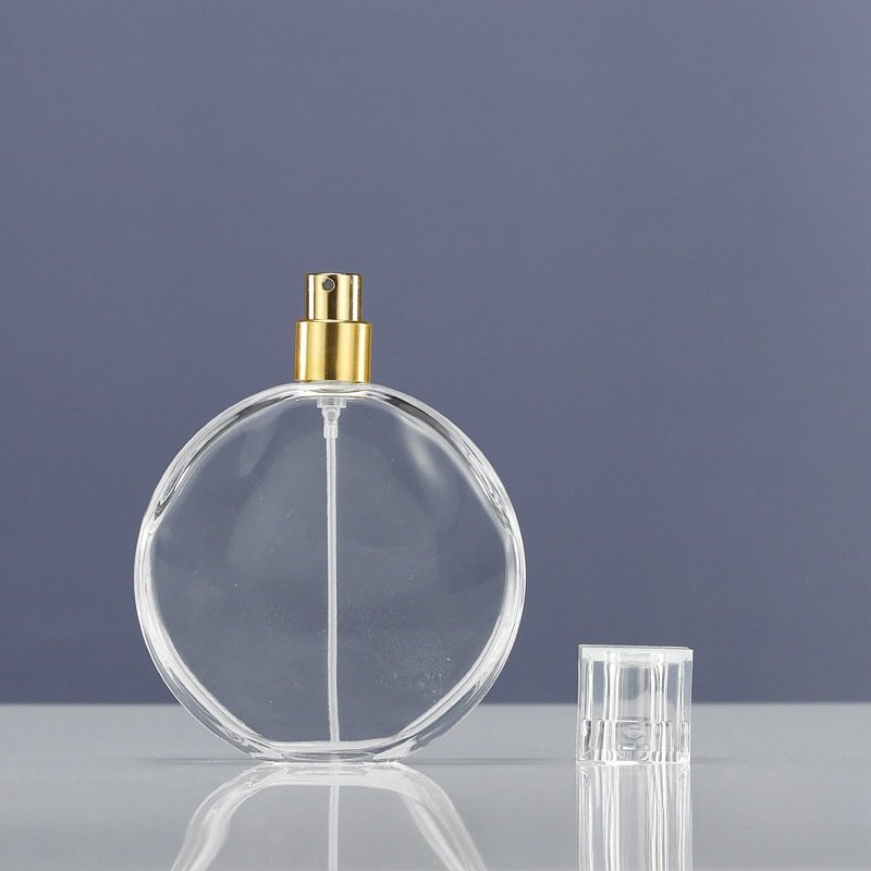 Perfume Packaging Oval Flat Recyclable 100ml Glass Bottles With Pump Sprayer Cap