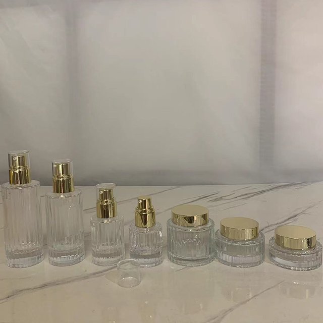 Hengjian 30ml 40ml 100ml 120ml cosmetic packaging glass bottle beauty container 30g 50g 100g empty face cream jar with gold lid