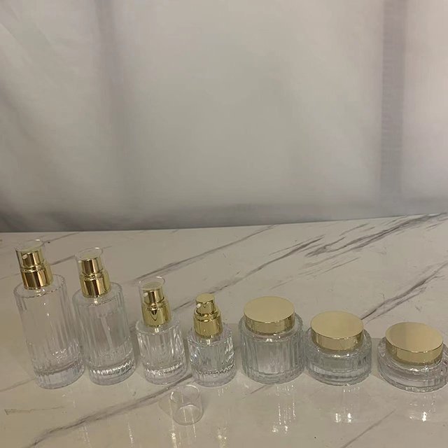 Hengjian 30ml 40ml 100ml 120ml cosmetic packaging glass bottle beauty container 30g 50g 100g empty face cream jar with gold lid