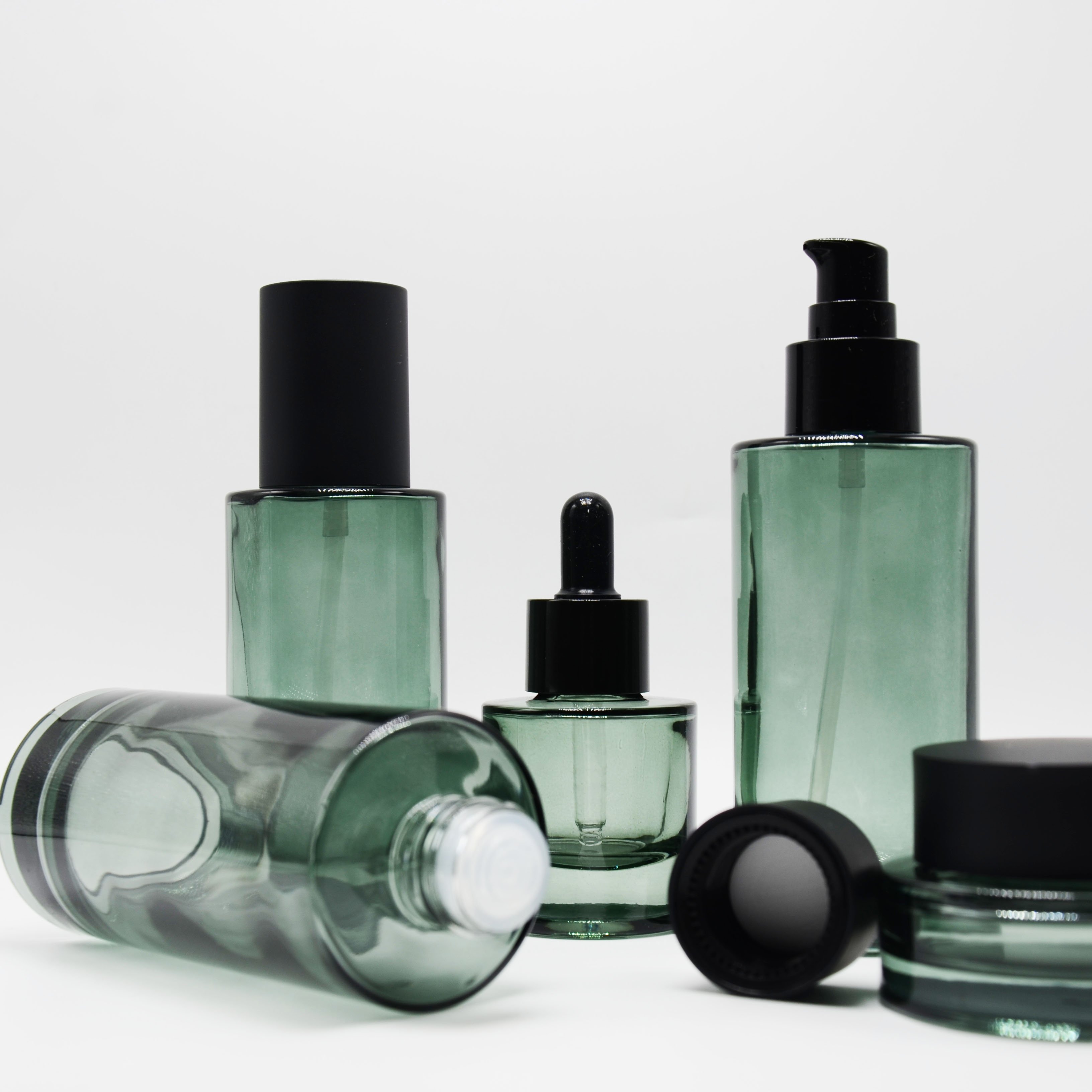High-end Cosmetic Packaging Set 50g 30ml 50ml 100ml 120ml Flat Shoulder Glass Lotion Pump Serum Dropper Bottles Cream Jars