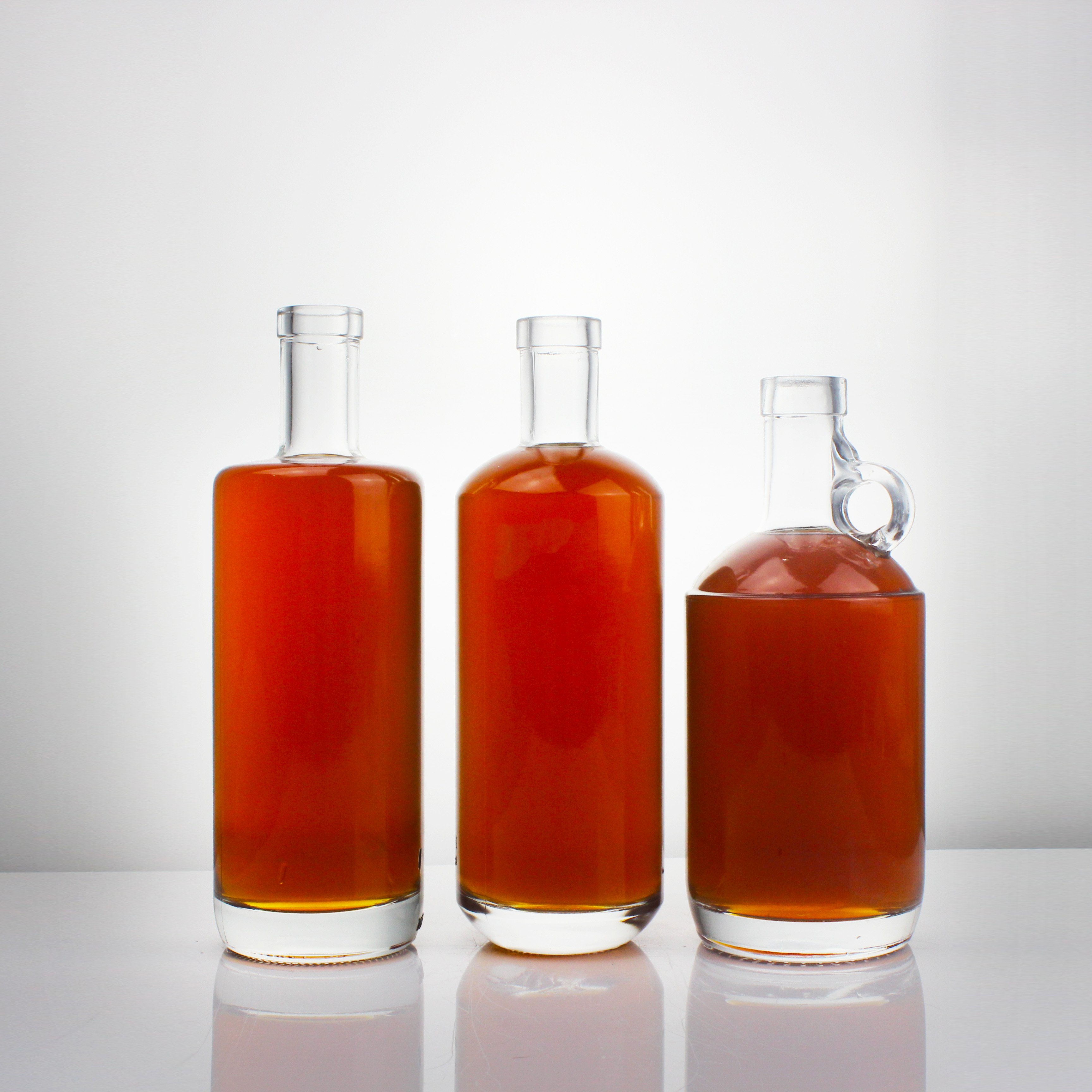 High Quality Professional Factory Directly 750Ml Round Glass Bottle Empty Glass Liquor Beverage Bottle