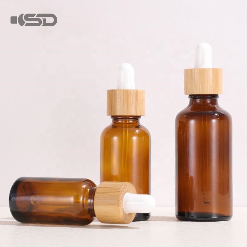 Wholesale Cosmetic Bottle 5-100ml Bottles Cosmetic Bamboo Oil Dropper Amber Glass Bottle With Bamboo Dropper