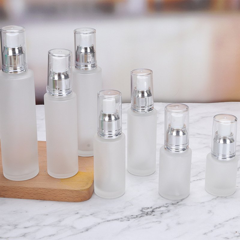 Wholesale spot cosmetic travel dispenser Empty bottle pressed fine mist spray Emulsion matte glass pump bottle