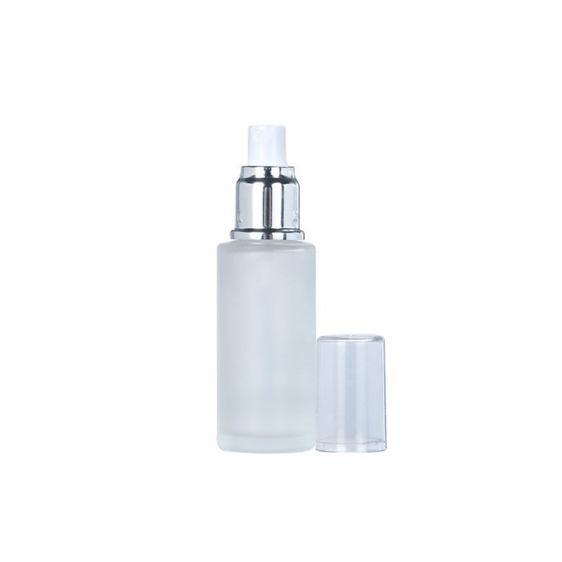 Wholesale spot cosmetic travel dispenser Empty bottle pressed fine mist spray Emulsion matte glass pump bottle