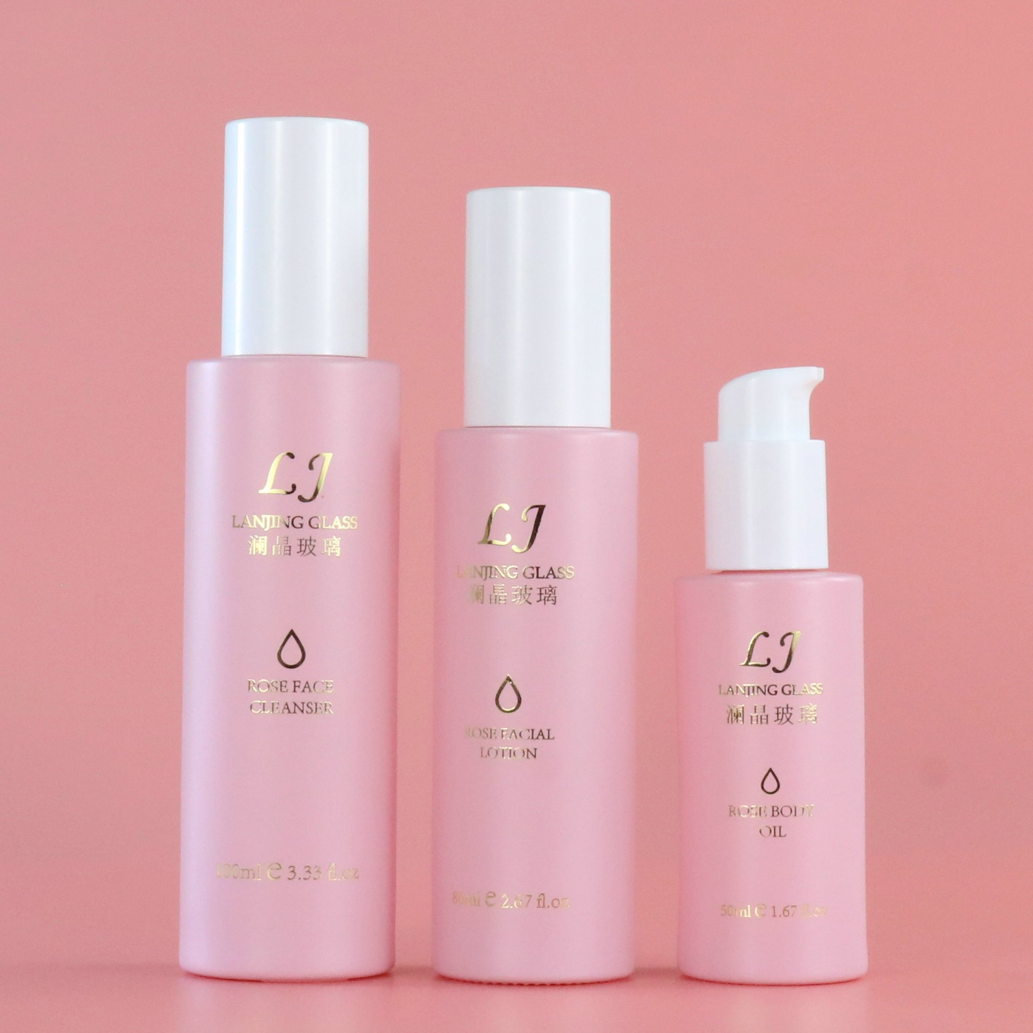 Luxury 120ml 100ml empty pink round frosted bottle glass skincare pump cosmetic packaging