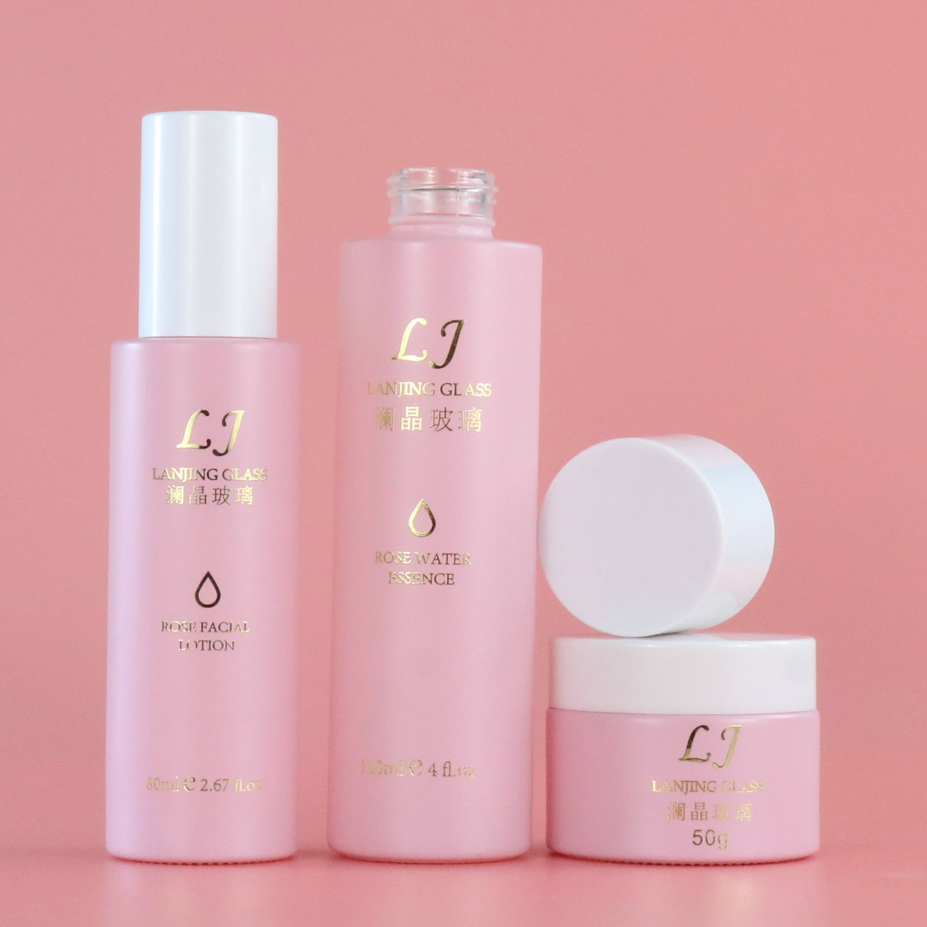 Luxury 120ml 100ml empty pink round frosted bottle glass skincare pump cosmetic packaging