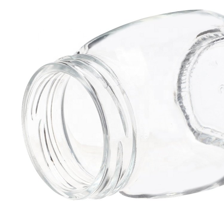 Popular sell 50ml 75ml 100ml empty clear custom screw mouth packing bird's nest bottles glass jam jar with metal lid