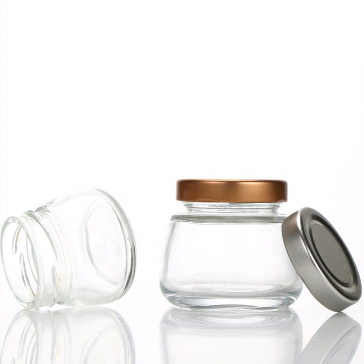 Popular sell 50ml 75ml 100ml empty clear custom screw mouth packing bird's nest bottles glass jam jar with metal lid