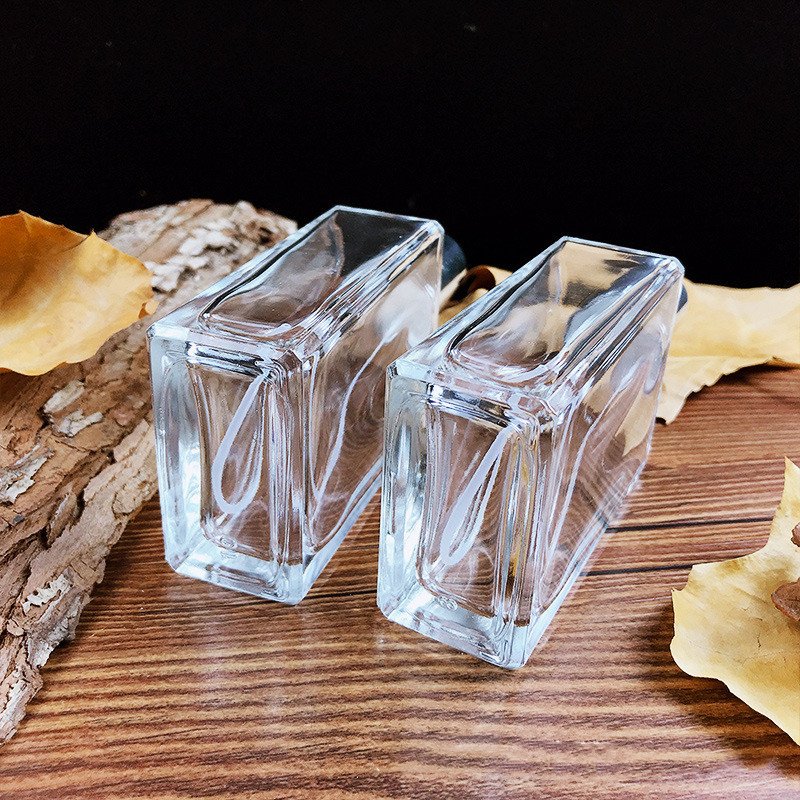 High Quality Luxury Design 15ml 30ml 100ml glass spray dropper bottles essential oil perfume 1oz square rectangle glass bottle