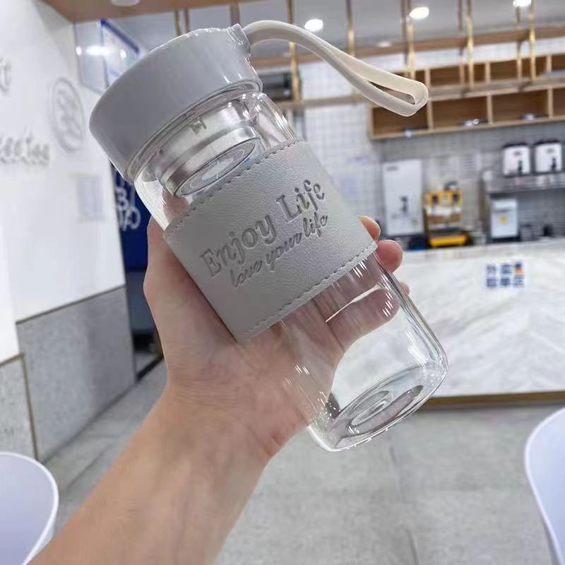 wholesale 350/450ml clear borosilicate glass water bottle custom logo plain eco portable drinking cup with silicone sleeve
